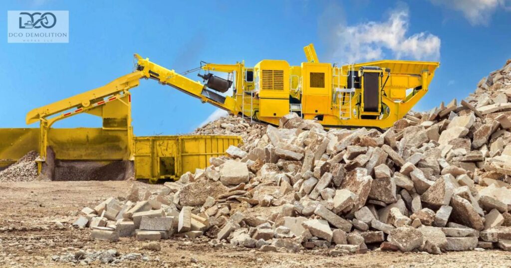 Concrete waste recycling process at a demolition site in Dubai UAE